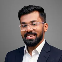 A portrait of a young man smiling